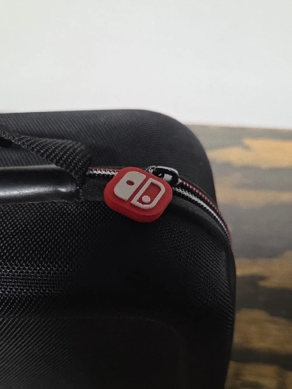 Nintendo Black Carry Case with Red Logo and Accents